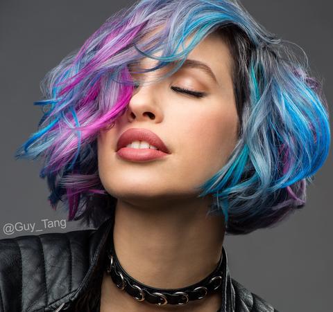 a model with blue and pink hair color