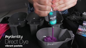 guy tang squeezing hair color into bowl